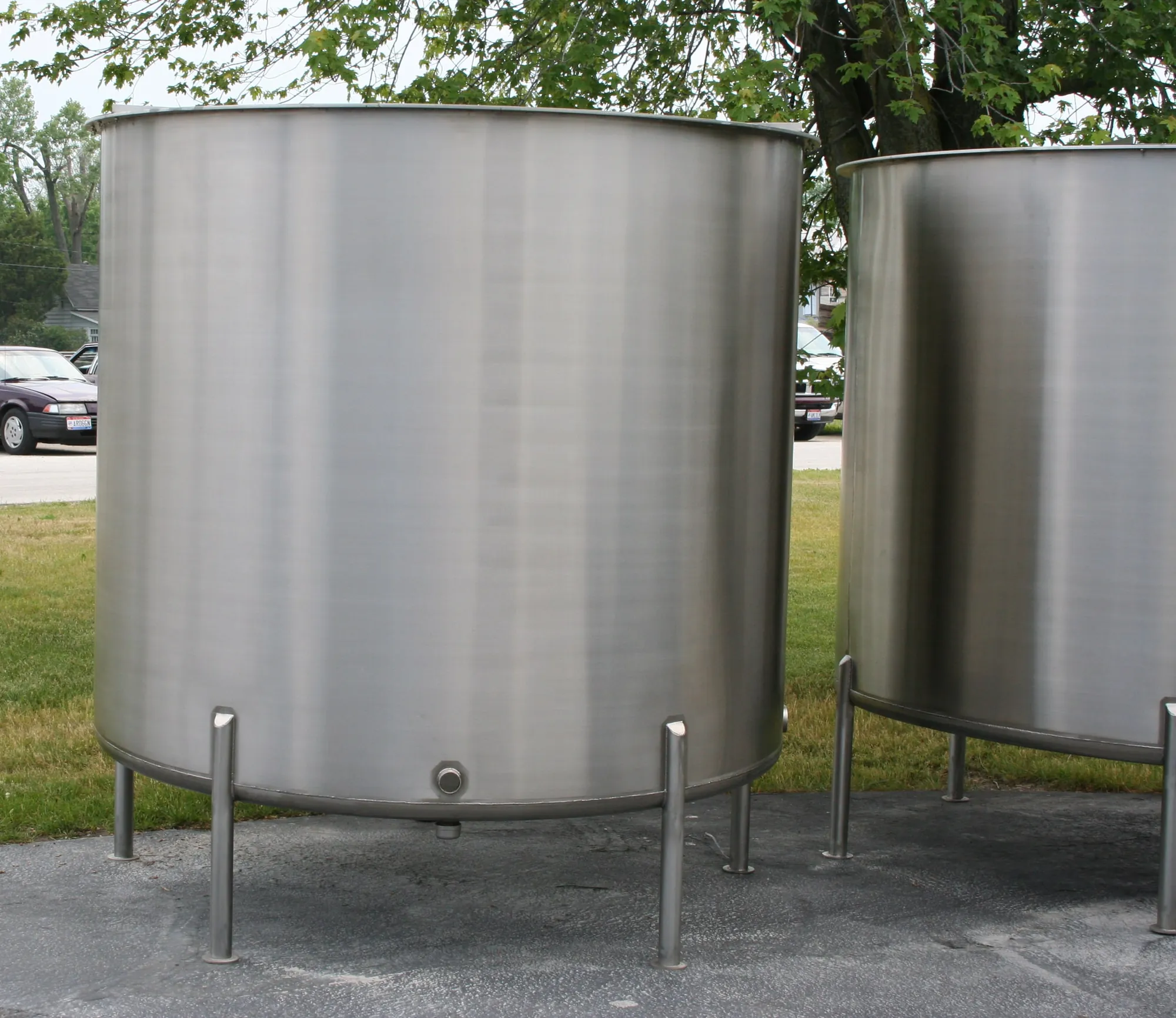 Fabricated stainless steel tanks staged in the outdoor lot at Northern Manufacturing