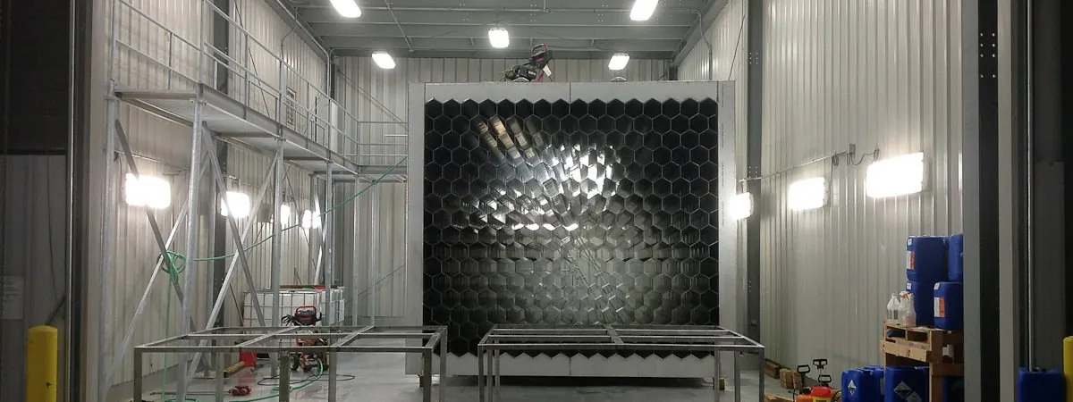 Stacked 309S stainless steel plate blanks with heat-number material test tags at Northern Manufacturing