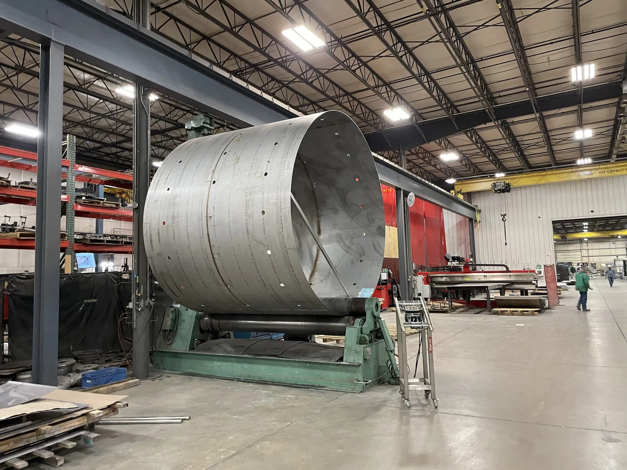 Large steel plate rolled into a cylindrical shell on a plate roll in the Northern Manufacturing shop