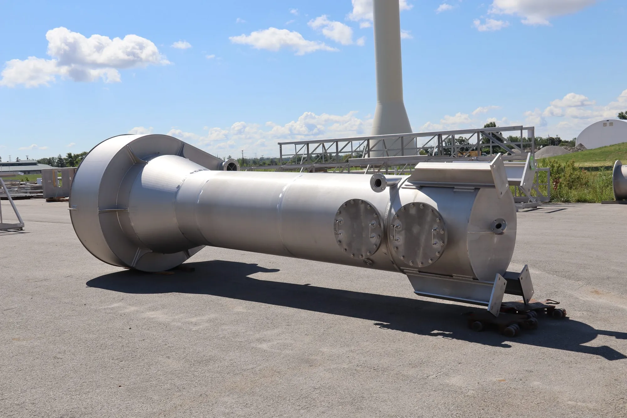 Completed stainless steel scrubber vessel staged outdoors at Northern Manufacturing