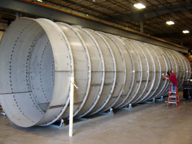 large-diameter stainless exhaust duct on shop dollies at Northern