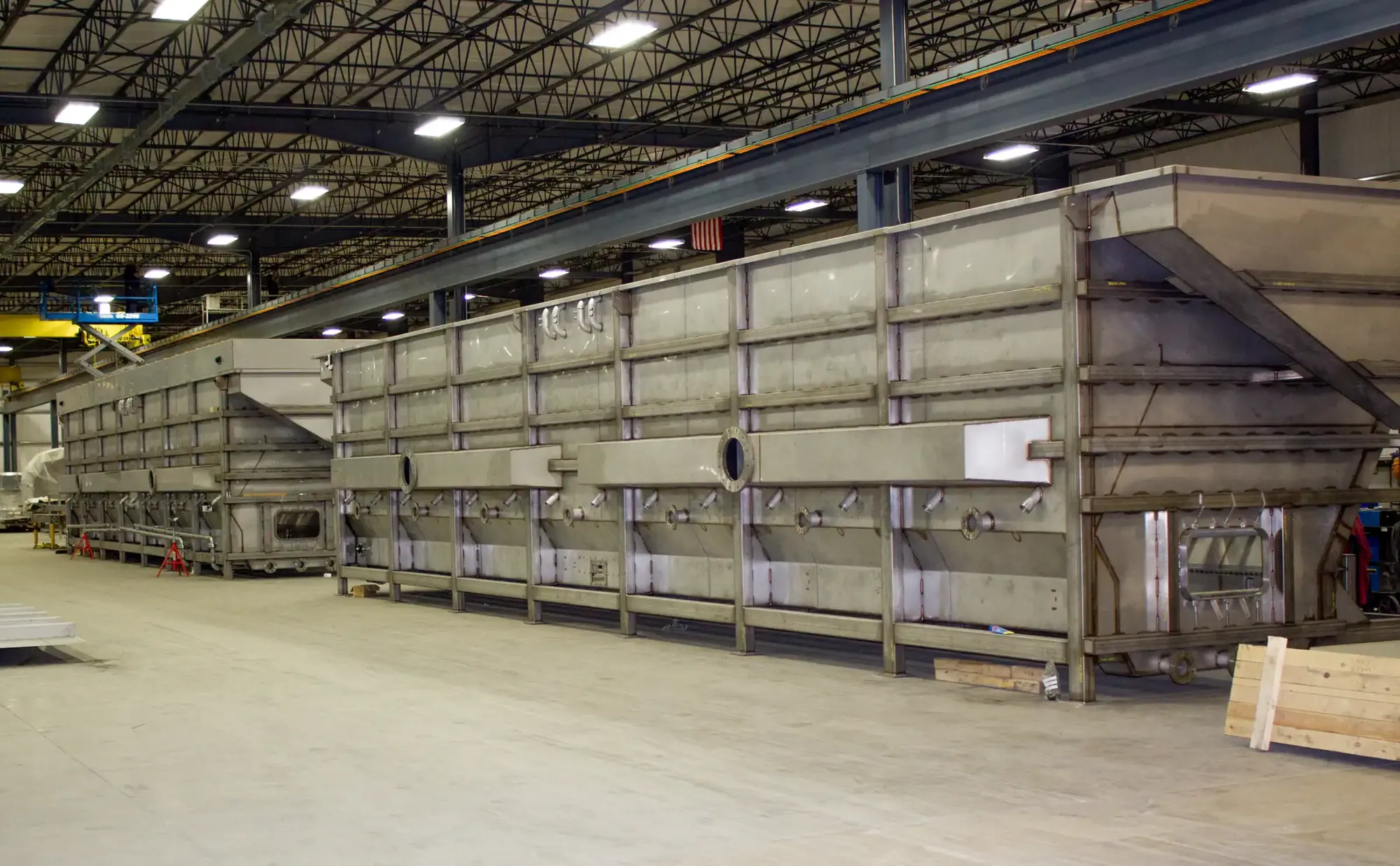 Long multi-section stainless steel assembly fit up end to end on the Northern Manufacturing shop floor
